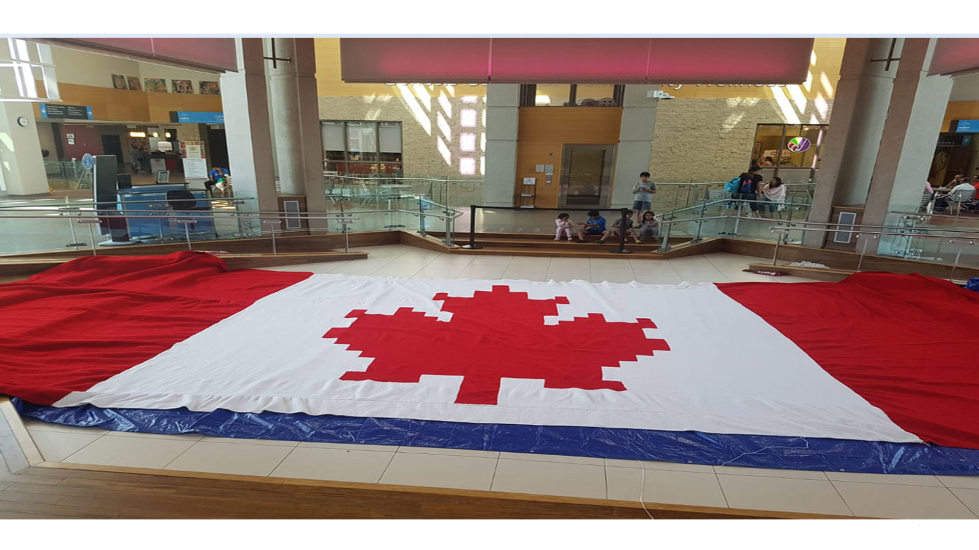 A Tribute to Canada  By Minu Bhatia. The talented and passionate RED Geet Mala Host Minu Bhatia, crocheted a 20 x 40 foot Canadian Flag